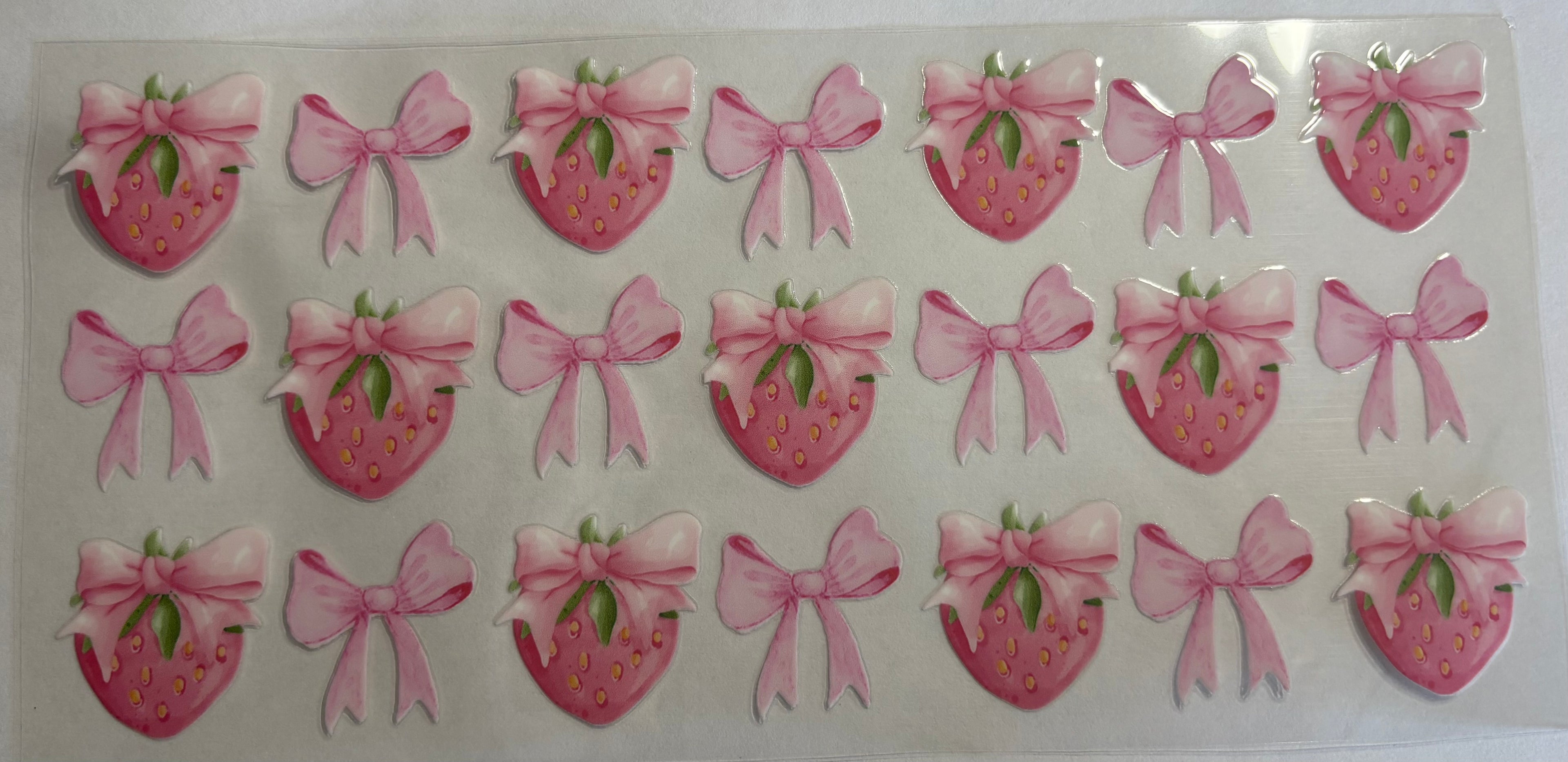 Pink strawberries with pink bows